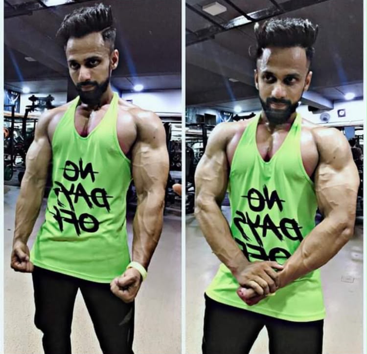 Aamir Siddique, personal trainer, posing in the gym